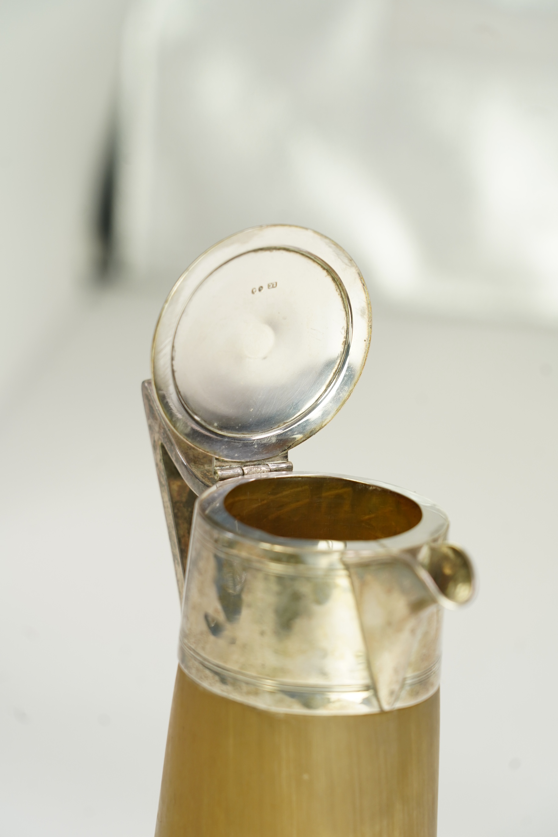 A late Victorian silver mounted horn claret jug and hinged cover, by John Clemmens